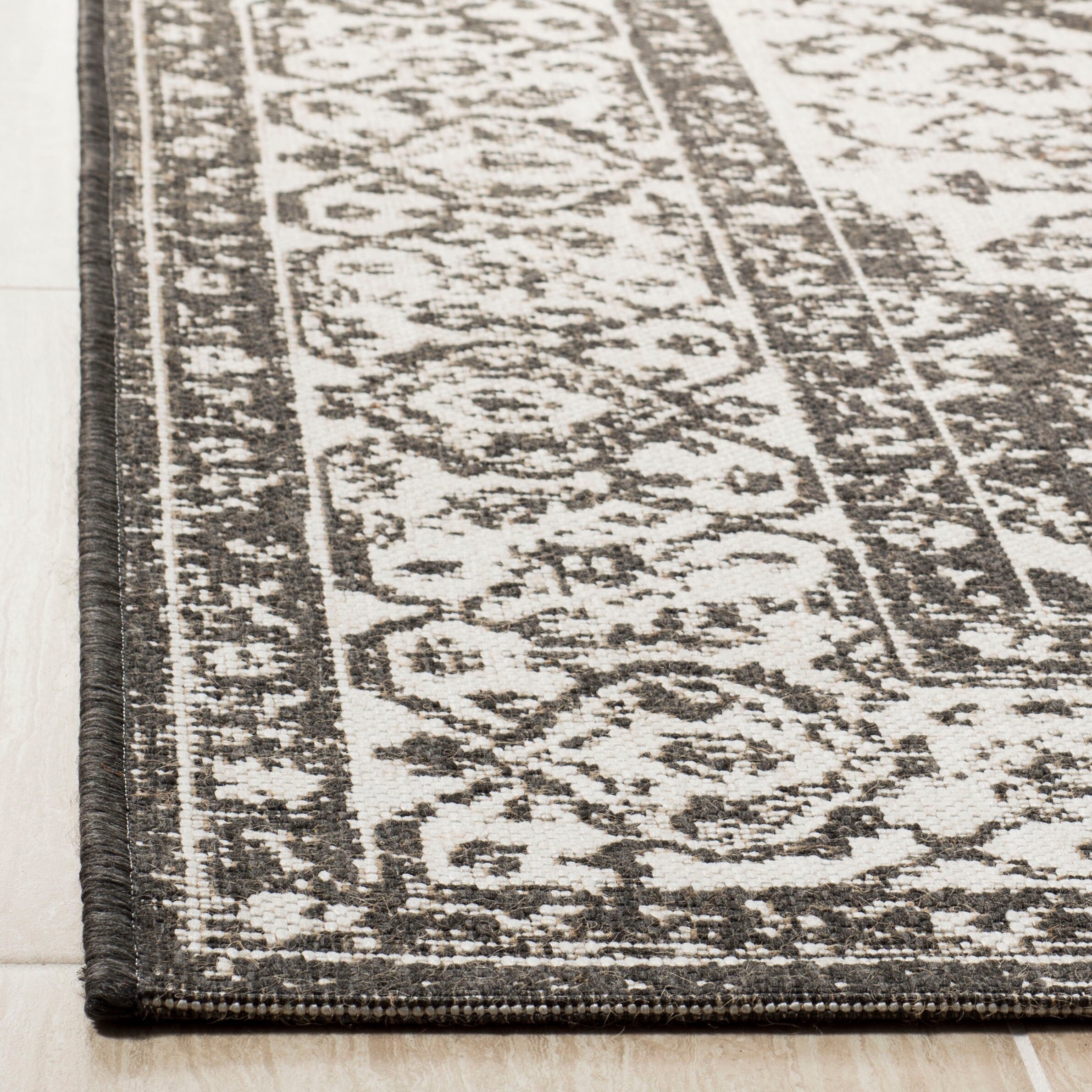 Tapis de jardin imperméable d'intérieur/extérieur SAFAVIEH Linden Louann
