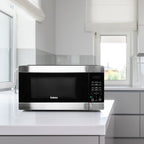 Four à micro-ondes de comptoir noir de 0,9 pi³ et 900 W avec cuisson express à une touche