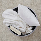 Pouf de rangement rond touffeté Donovan