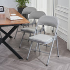 Chaises pliantes élégantes en fer et PVC pour congrès et expositions, blanches