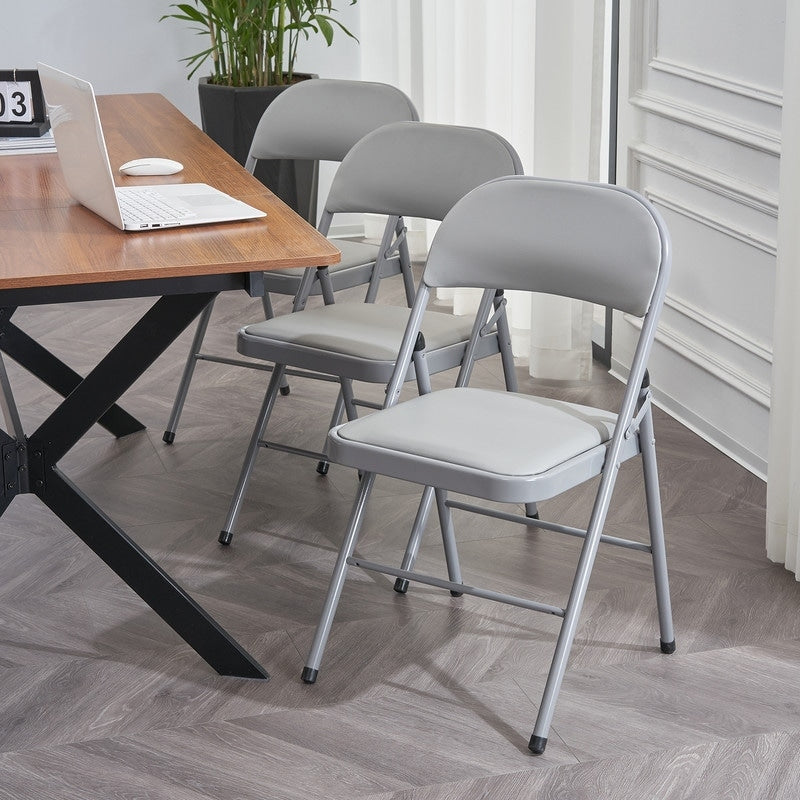 Chaises pliantes élégantes en fer et PVC pour congrès et expositions, blanches