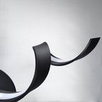 Applique murale à LED pour salle de bain au design moderne en spirale, à intensité variable