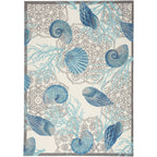 Tapis d'intérieur et d'extérieur Waverly Sun &amp; Shade Shore Thing à motif de coquillages tropicaux et floraux