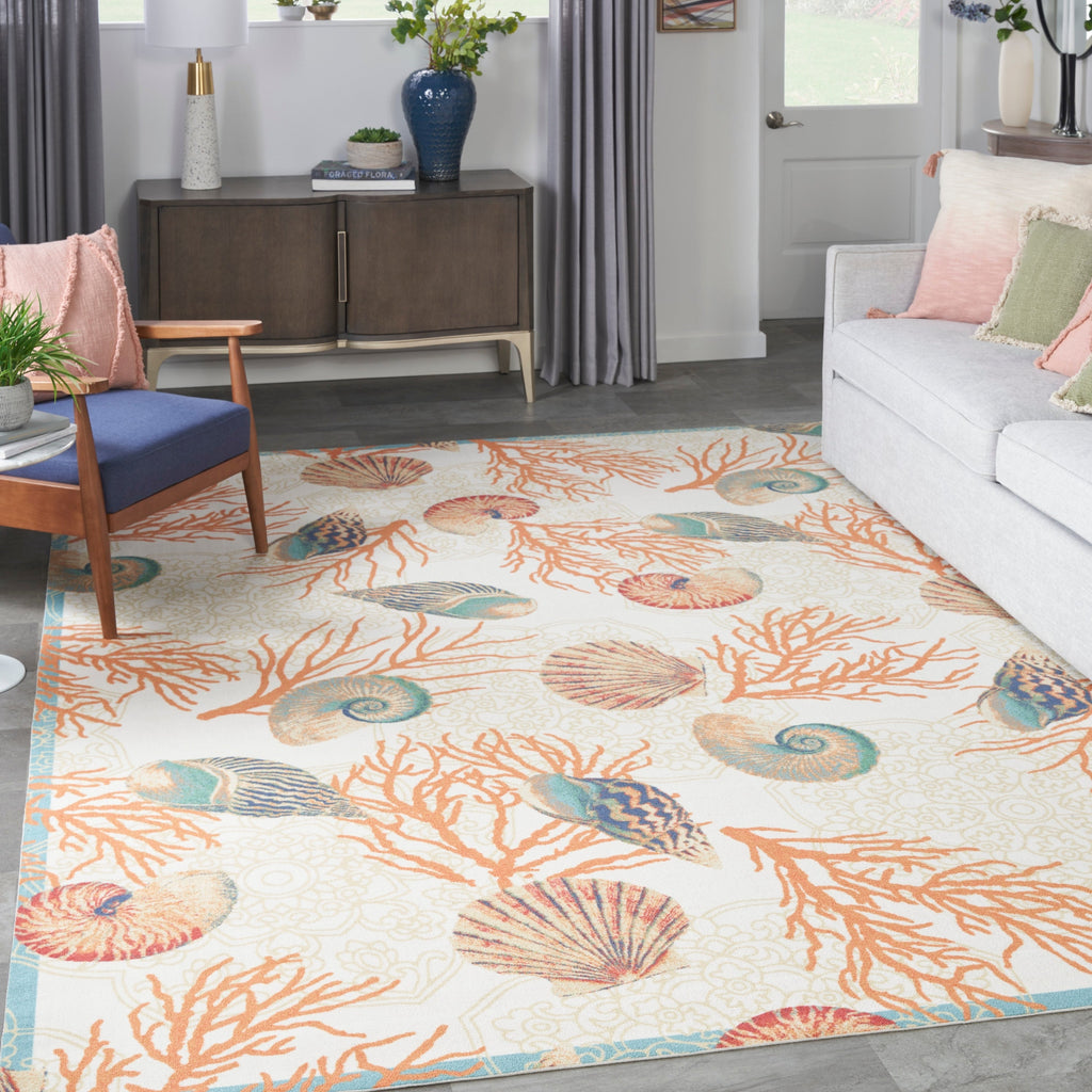 Tapis d'intérieur et d'extérieur Waverly Sun &amp; Shade Shore Thing à motif de coquillages tropicaux et floraux