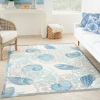 Tapis d'intérieur et d'extérieur Waverly Sun &amp; Shade Shore Thing à motif de coquillages tropicaux et floraux