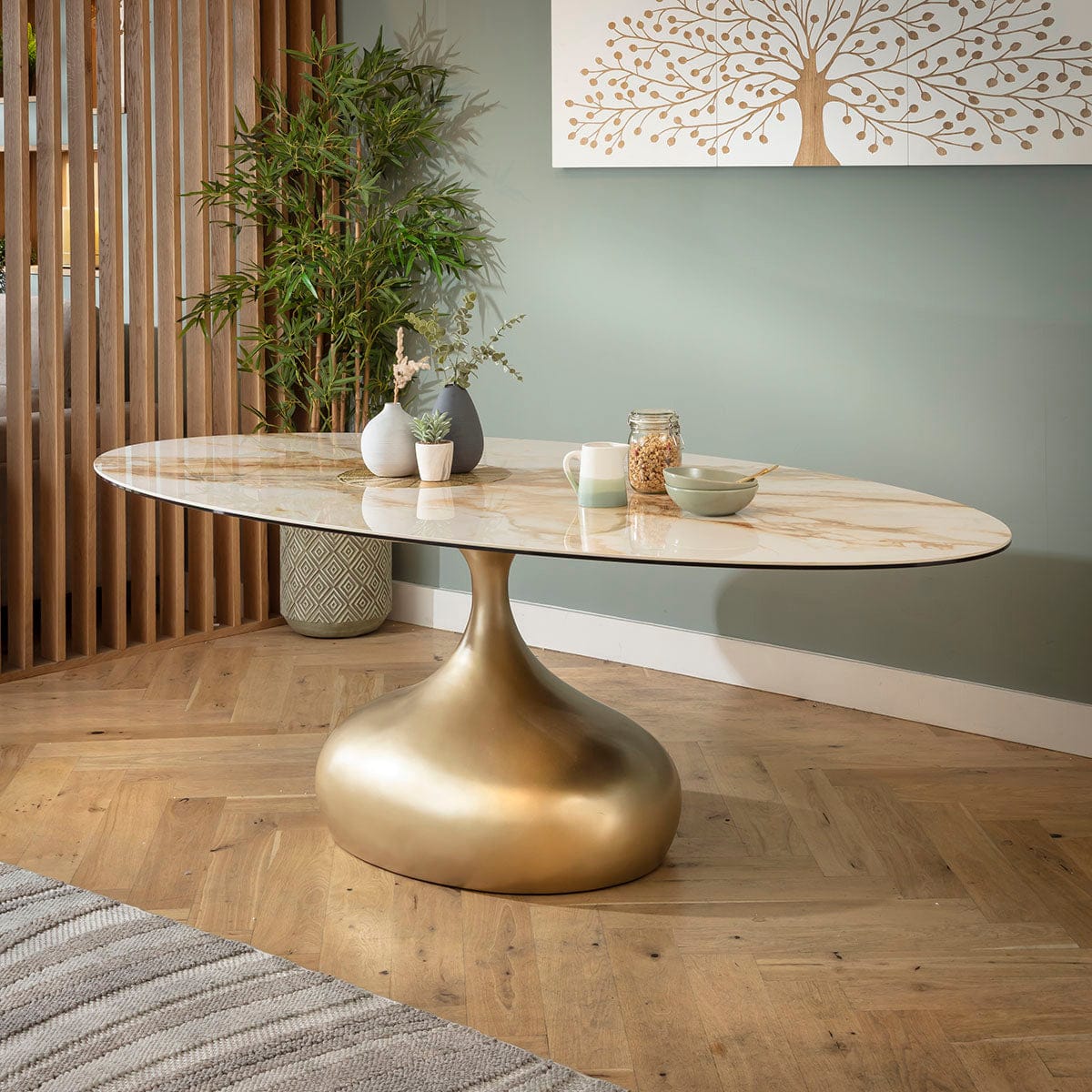 Table de salle à manger ovale Venusia 8 places en céramique effet marbre blanc et or 240 x 120 cm